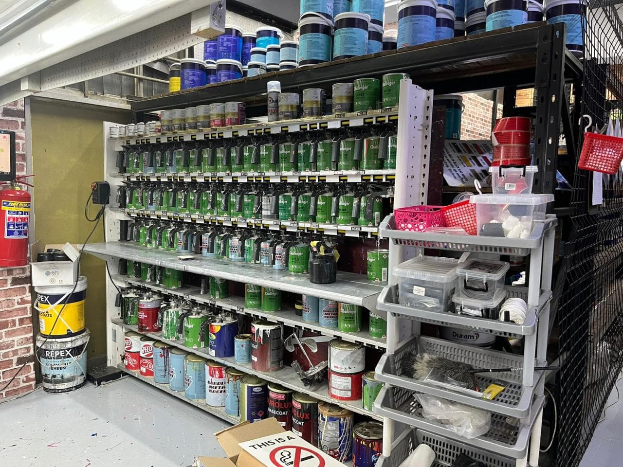Paint tins colour-matched in store